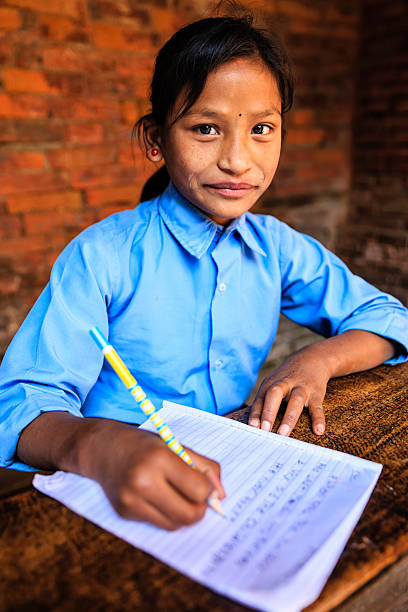 istock Nepali schoolgirl in classroom 477109632