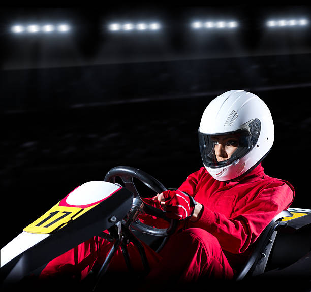 istock Young woman karting racer 477111612