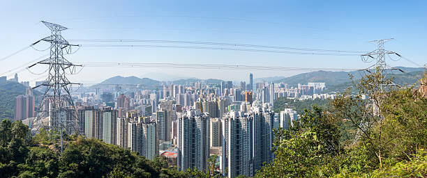 istock Transmission tower and the City 477113503