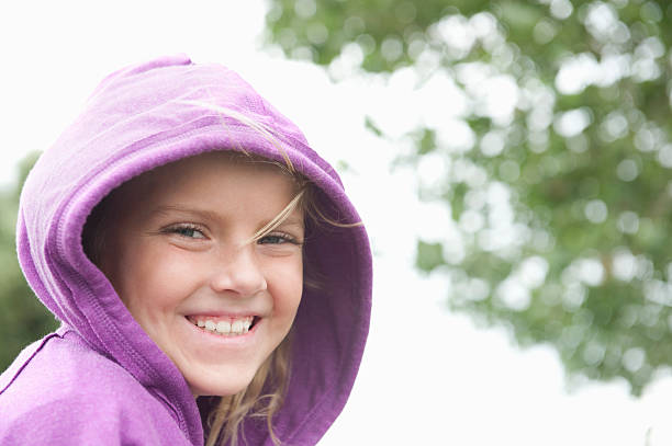 istock Female In Purple Hooded Jacket 477113919