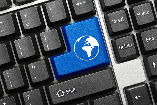 istock Conceptual keyboard - Blue key with world symbol 477114410