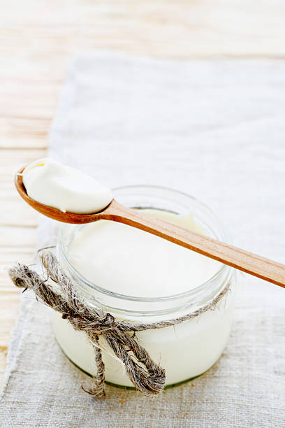 istock sour cream in a transparent jar 477114771