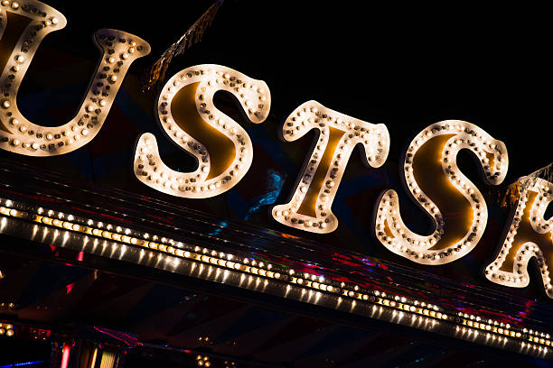 istock neon light detail at fairground during summer holiday 477117458