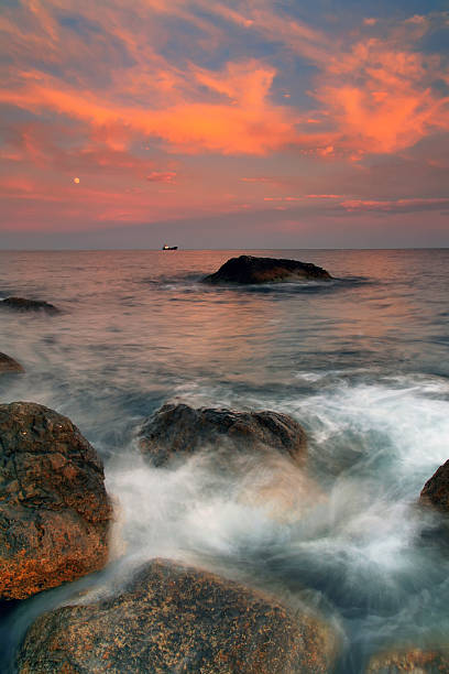 istock Calm sea at sunset 477117544