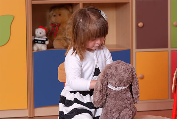 istock Two-year girl playing and learning in preschool 477118244