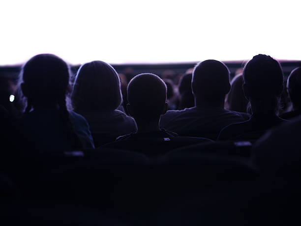 istock People watching cinema 477119361