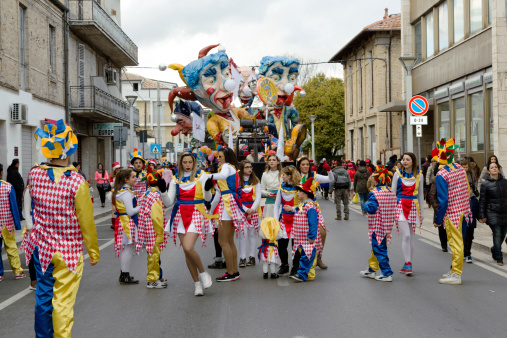 Sant'Egidio alla Vibrata, Italy - March 2, 2014: Floats and happy masked people walking the streets of Sant'Egidio alla Vibrata to celebrate Carnival 2014