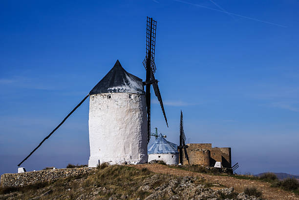 istock Cervantes Don Quixote windmills and Consuegra castle. Castile La 477119543
