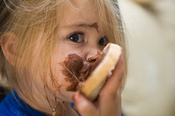 istock Girl is eating 477121376