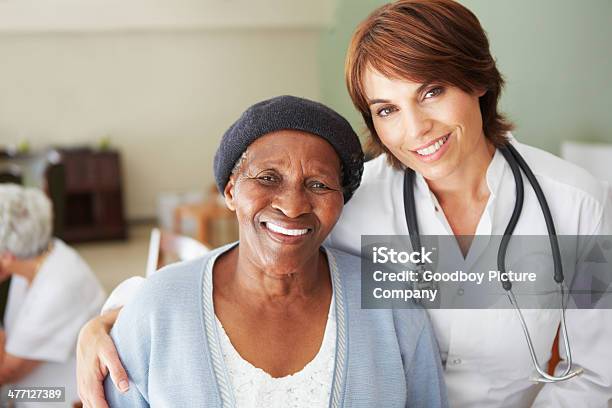 Providing Kindly Support To Her Patients Stock Photo - Download Image Now - Patient, Doctor, Portrait