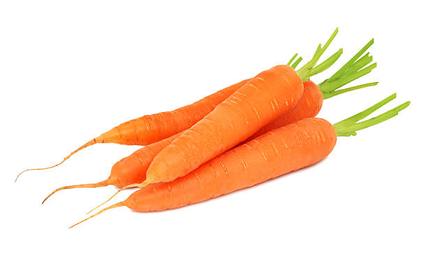 istock Stack of ripe carrots with cutted tops (isolated) 477129644