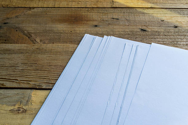 istock white paper on wooden 477129876