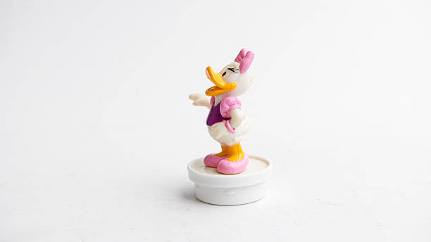 Studio Shot Of Daisy Duck Figure Cartoon Character Stock Photo - Download  Image Now - Characters, Daisy, Disney - iStock