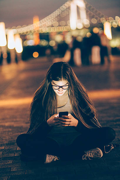 istock Young nerd woman texting on the phone 477134946