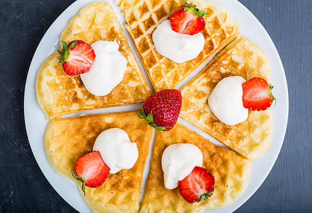 istock Waffles with strawberry and whipped cream 477139234