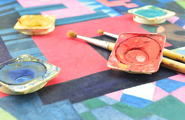 istock Messy used water color paint box and paintbrush 477139480