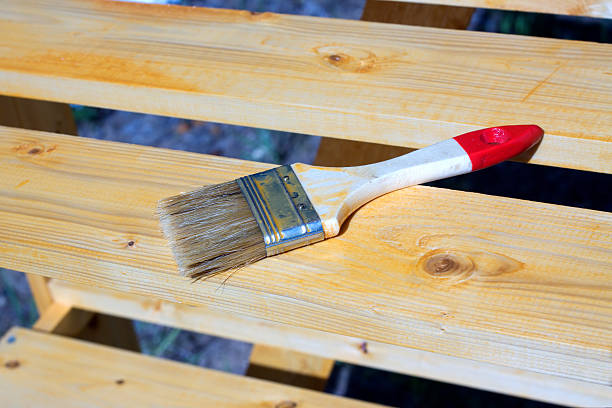 istock Brush lying on a painted wooden shelving surface 477139494
