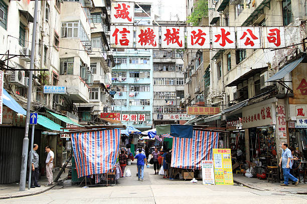 Hong Kong Street Market - Mong kok Saturday morning in Mong kok wet market, Hong Kong, China mong kok stock pictures, royalty-free photos & images