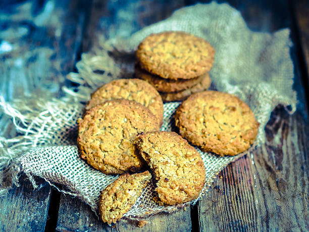 istock Vintage oatmeal cookies on rustic wooden background 477140215