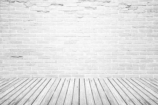istock Old interior room with brick wall and wood floor 477141006