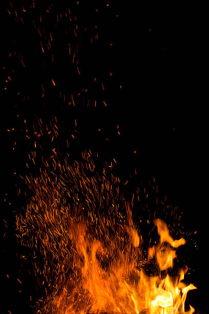 istock Fire and orange sparks on a black background 477143291
