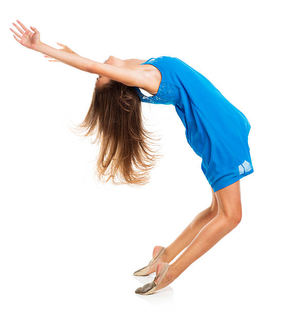 istock Young girl dancing in a blue dress 477144432