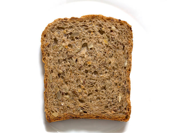 brot. scheibe brot - loaf of bread bread portion 7 grain bread stock-fotos und bilder