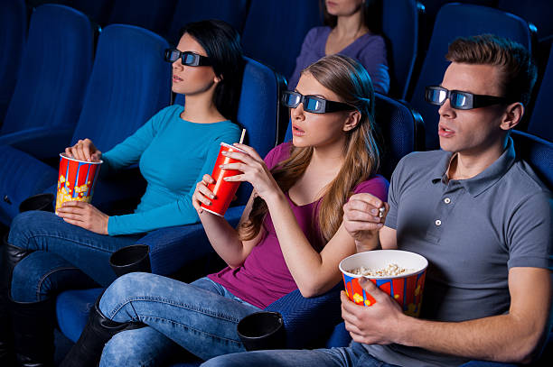 istock Enjoying three-dimensional movie. 477145677