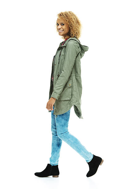 istock Happy woman walking 477148306