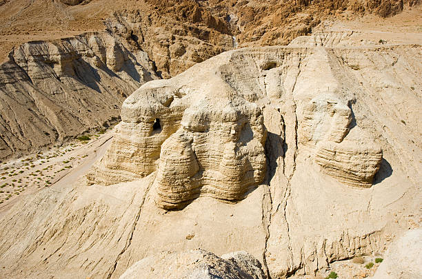 Scrolls cave of Qumran The scrolls cave of Qumran in Israel where the dead sea scrolls have been found dead sea scrolls stock pictures, royalty-free photos & images