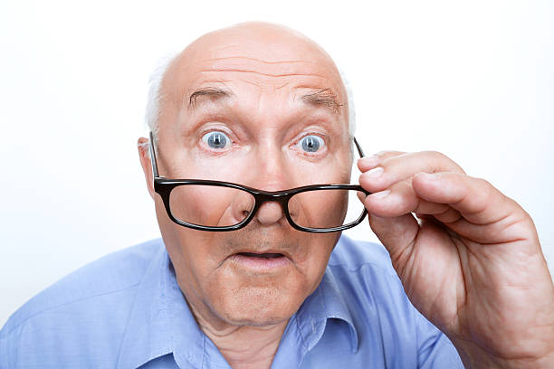 istock Surprised grandfather holding glasses 477155312