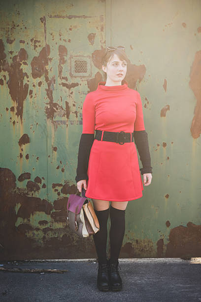 istock young beautiful red dressed vintage hipster woman 477155332