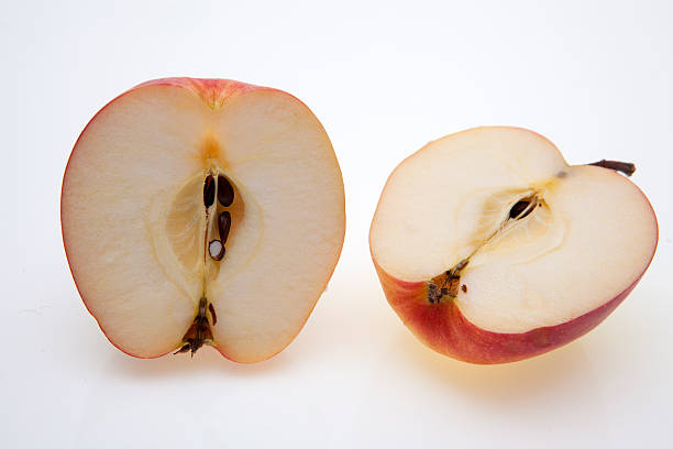 istock Two halves of sliced ​​apple 477156625
