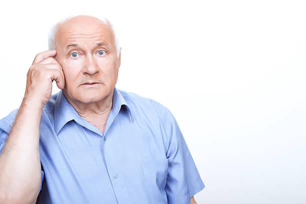 istock Puzzled grandfather involved in thinking 477158630