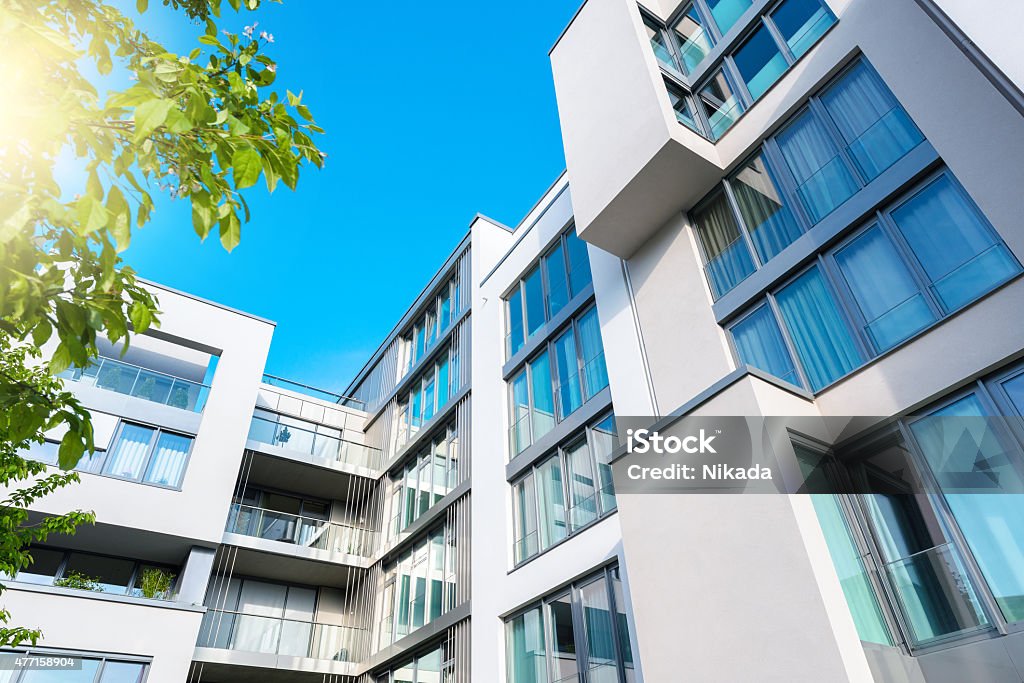 New white apartment houses New white apartment houses in Berlin, Germany Apartment Stock Photo