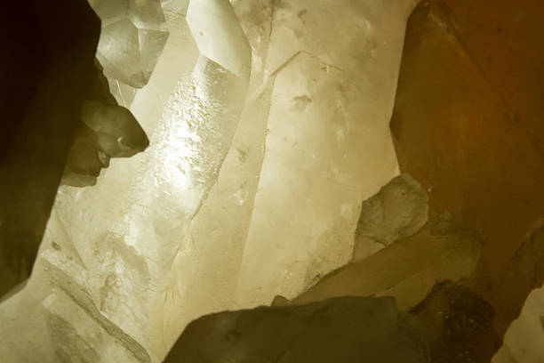 istock piece of crystal illuminated by the warm light 477159220