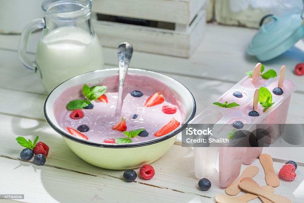 Cold ice cream with fruits and mint leaf Cold ice cream with fruits and mint leaf. 2015 Stock Photo