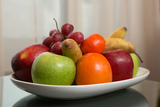 istock Sweet fresh fruits on plate 477163077