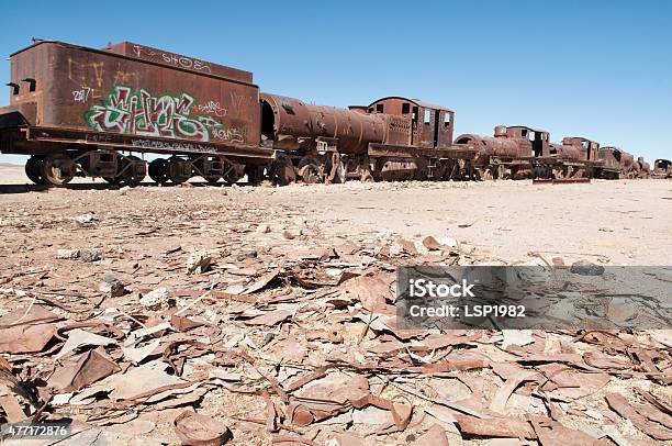 Train Cemetery Rusty Junk Salar Desert Bolivia Stock Photo - Download Image Now - 2015, Antique, Bad Condition