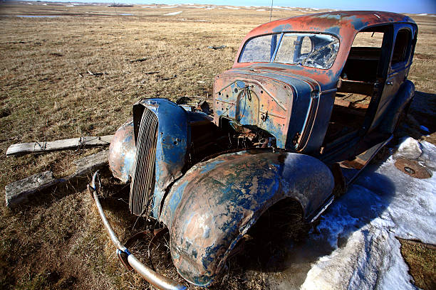 istock Old Vintage Car in Field Saskatchewan 477175121