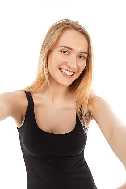 istock young pretty blonde women taking selfie 477181186