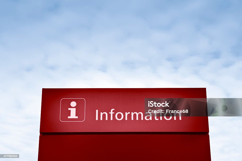 Red information sign against a blue sky Red information sign against a blue sky - concept image 2015 Stock Photo