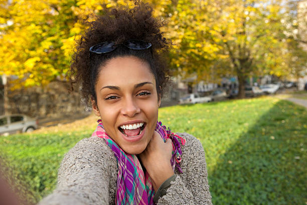 Selfie portrait of a happy young woman stock photo