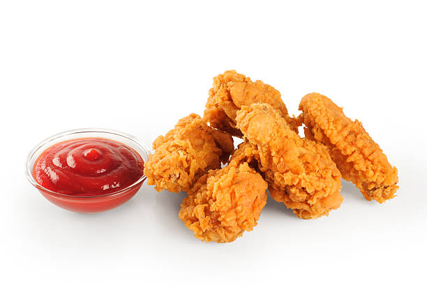 istock Fried in batter chicken wings and ketchup 477187988