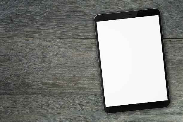 istock generic tablet pc on top of wooden table 477190606