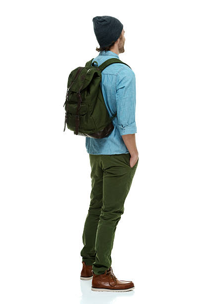 istock Rear view of hipster standing and looking away 477192410