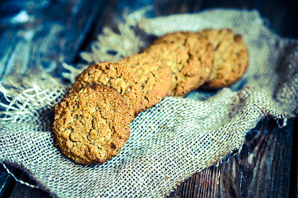 istock Vintage oatmeal cookies on rustic wooden background 477192645