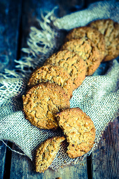 istock Vintage oatmeal cookies on rustic wooden background 477192671