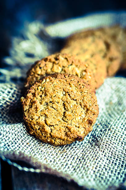 istock Vintage oatmeal cookies on rustic wooden background 477193797
