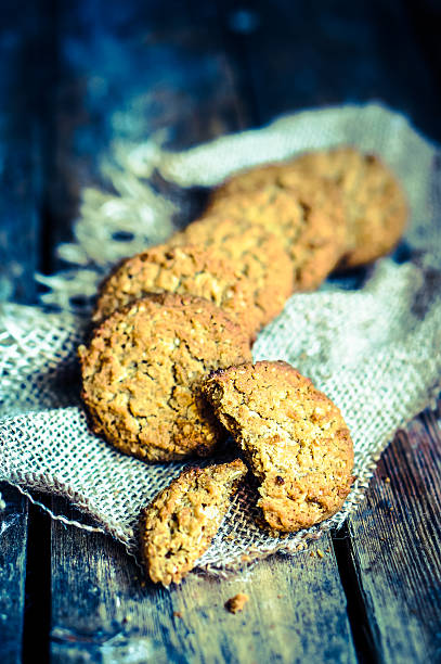 istock Vintage oatmeal cookies on rustic wooden background 477193887